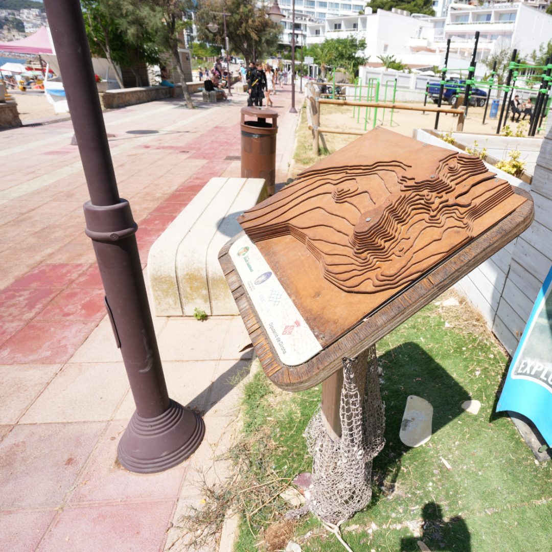 Engraved contour map mounted on an outdoor panel